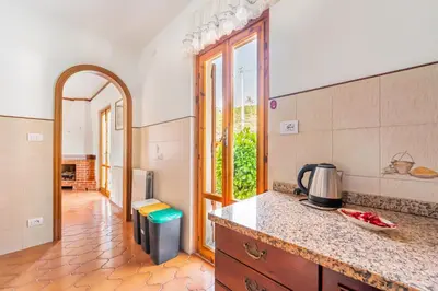 Cucina o angolo cottura di GuestHost - Yunger House with Garden and Balcony x5