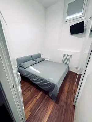 Letto o letti in una camera di Farini House
