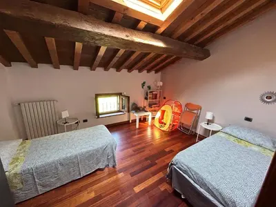 Letto o letti in una camera di B&B Corte Bassa 2