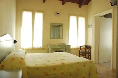Letto o letti in una camera di Albergo del Po