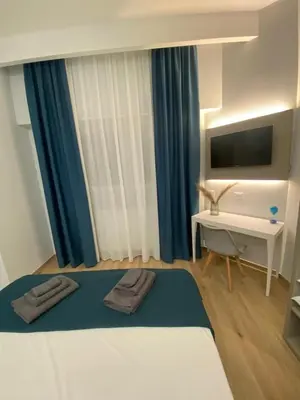 Letto o letti in una camera di Fla Rooms