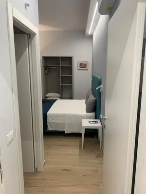Letto o letti in una camera di Fla Rooms