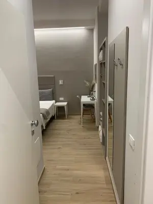 Letto o letti in una camera di Fla Rooms