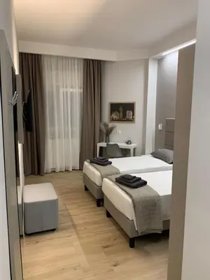 Letto o letti in una camera di Fla Rooms