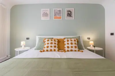 Letto o letti in una camera di DUOMO Relax in centro, WiFi, Aria Condizionata