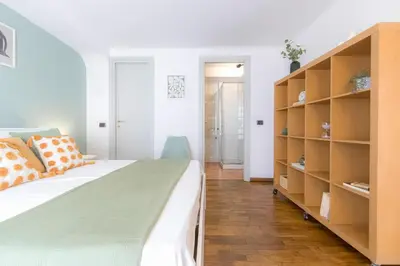 Letto o letti in una camera di DUOMO Relax in centro, WiFi, Aria Condizionata