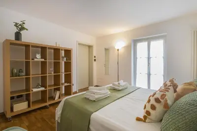 Letto o letti in una camera di DUOMO Relax in centro, WiFi, Aria Condizionata