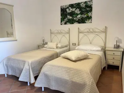 Letto o letti in una camera di Agriturismo I FIORI