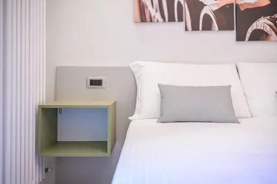 Letto o letti in una camera di Affittacamere I Tesori di Modena