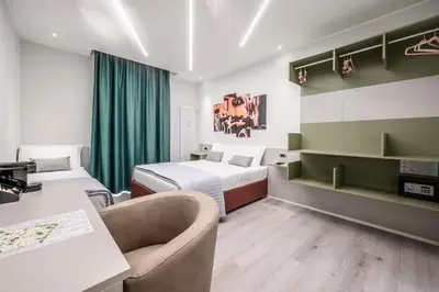 Letto o letti in una camera di Affittacamere I Tesori di Modena