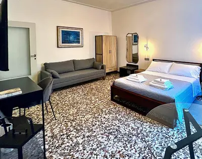 Letto o letti in una camera di Casa Margherita