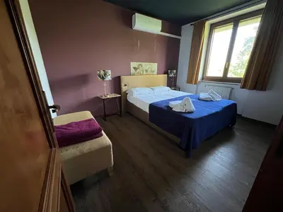 Letto o letti in una camera di Luxe Villa Monte Rosa met zwembad in een wijngebied