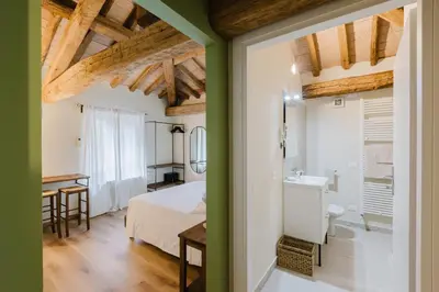 Letto o letti in una camera di Locanda sul fiume
