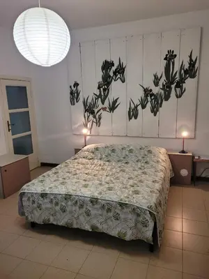 Letto o letti in una camera di B&B Arcadia
