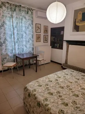 Letto o letti in una camera di B&B Arcadia