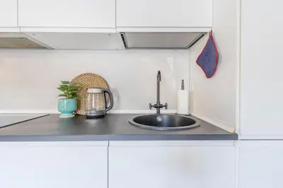 Cucina o angolo cottura di ViaEmilia 2 min dal centro, 4 Persone, WIFI, Aria condizionata