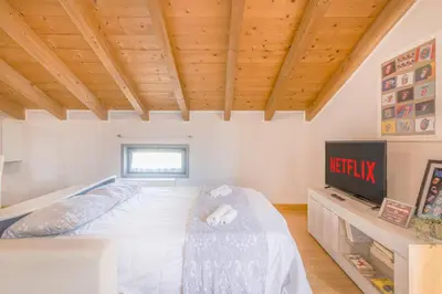 Letto o letti in una camera di Stazione 200m - Wifi - Aria condizionata - Smart TV