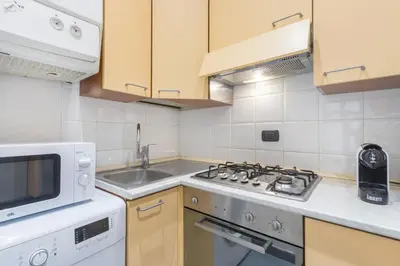Cucina o angolo cottura di VISTA DUOMO, 4 persone, WiFi, Aria condizionata, Smart TV