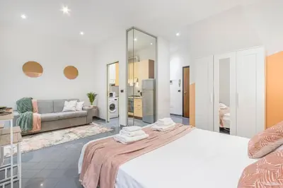 Letto o letti in una camera di VISTA DUOMO, 4 persone, WiFi, Aria condizionata, Smart TV