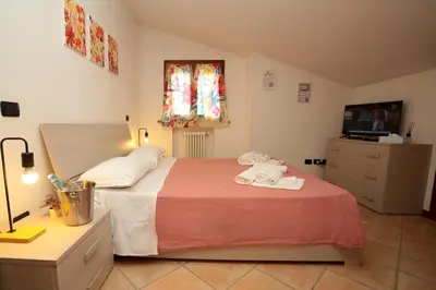 Letto o letti in una camera di Guest House Onde Chiare