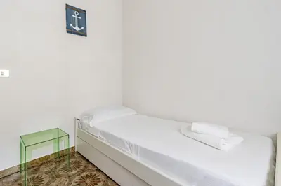 Letto o letti in una camera di GuestHost - Monterosso al Mare! Seaview Flat