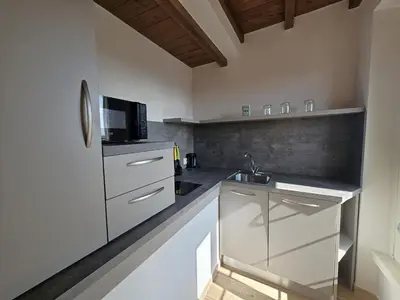 Cucina o angolo cottura di Patrizio Apartments-by Goccia di Lago