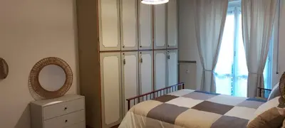 Letto o letti in una camera di Lusi's home al mare Lavagna