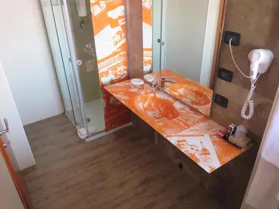 Letto o letti in una camera di Planet Hotel