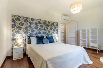 Letto o letti in una camera di Casa Andre