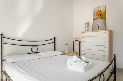 Letto o letti in una camera di GuestHost - Da Bianca Central & Functional Flat