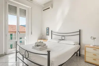 Letto o letti in una camera di GuestHost - Da Bianca Central & Functional Flat