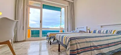 Letto o letti in una camera di 21A - Vista mare a 2 passi da tutto