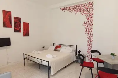 Letto o letti in una camera di Il roseto di Cremona, luminoso monolocale indipendente