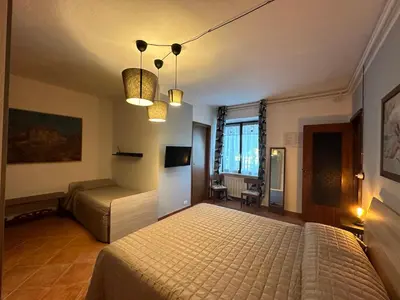 Letto o letti in una camera di B&B Ronco Oste