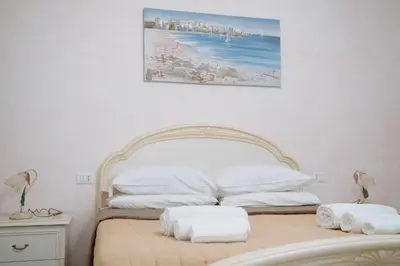 Letto o letti in una camera di Alle porte del borgo