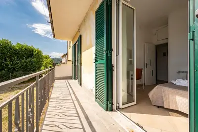 Letto o letti in una camera di GuestHost - Casa Nameste 5Terre Holiday Apartment