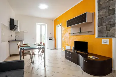 TV o dispositivi per l'intrattenimento presso GuestHost - Casa Nameste 5Terre Holiday Apartment