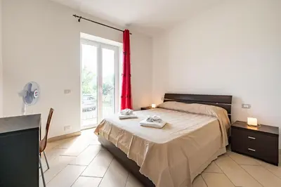 Letto o letti in una camera di GuestHost - Casa Nameste 5Terre Holiday Apartment