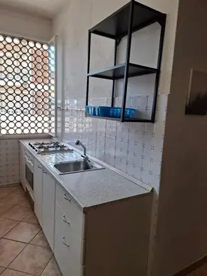 Cucina o angolo cottura di FARE BnB - Room Porta Castello