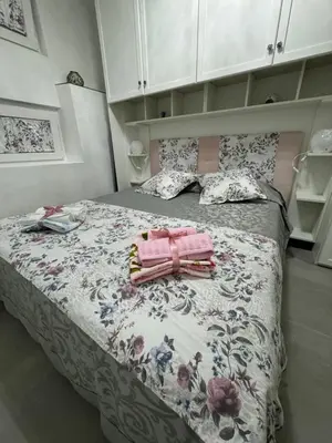 Letto o letti in una camera di Appartamento dal monumento