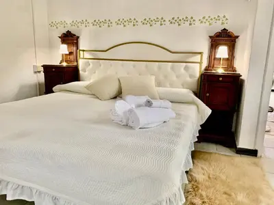 Letto o letti in una camera di Casa Adele