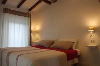 Letto o letti in una camera di Room & Breakfast A casa di Emma