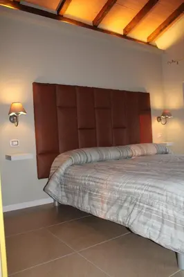 Letto o letti in una camera di Room & Breakfast A casa di Emma