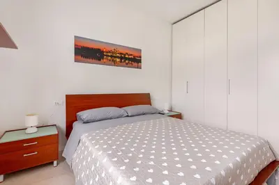 Letto o letti in una camera di BellaMantova 4