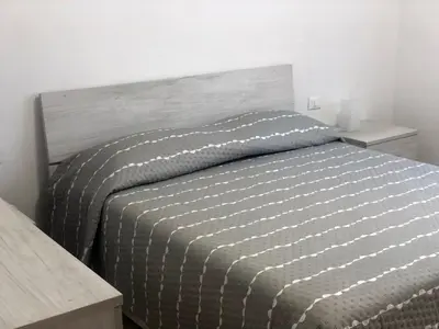 Letto o letti in una camera di Garden House Cristina La Spezia 5 terre