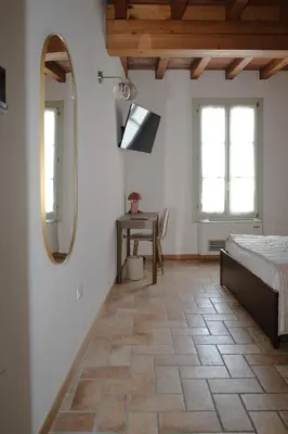 Letto o letti in una camera di Locanda La Motta