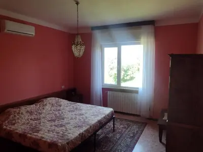 Letto o letti in una camera di B&B Cuccagna