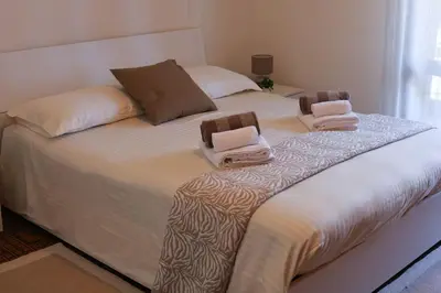 Letto o letti in una camera di Modena - vicino al centro - Free Parking & Wi-Fi