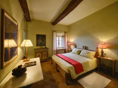 Letto o letti in una camera di Il Castello di Tassara