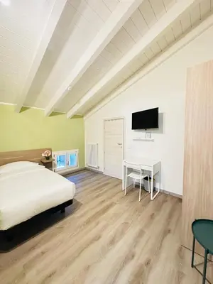 TV o dispositivi per l'intrattenimento presso Giardini B&B